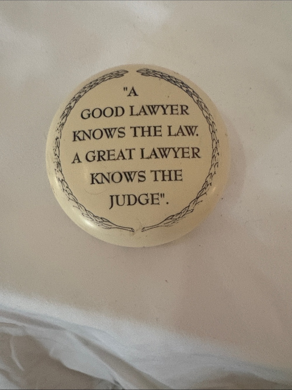 Novelty Lawyer Quote Pin - Cream with Black Text